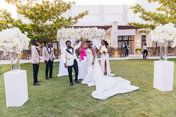 Bride and groom celebrating their destination wedding at Secrets Cap Cana